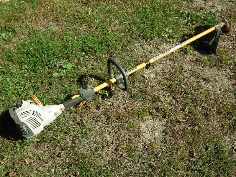 lot 20 image: Ryobi gas weed whip