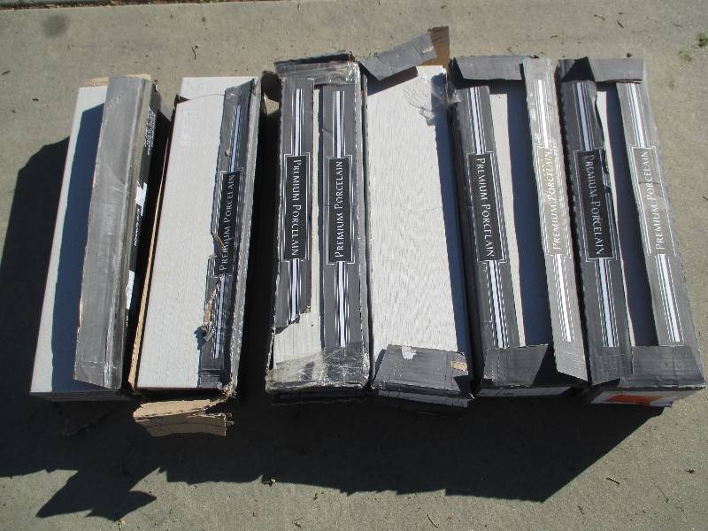 lot 25 image: 6 cases, 14 tiles per case, the top...
