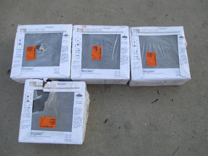 lot 44 image: 4 cases, some tiles are cracked.  1...