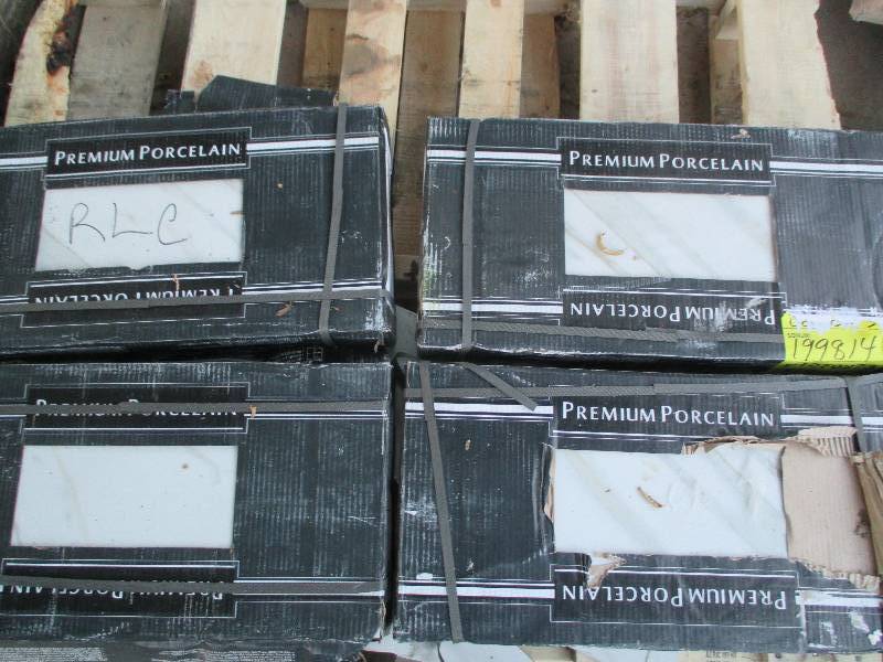 lot 52 image: 4 cases, 12 x 24 premium floor or ...