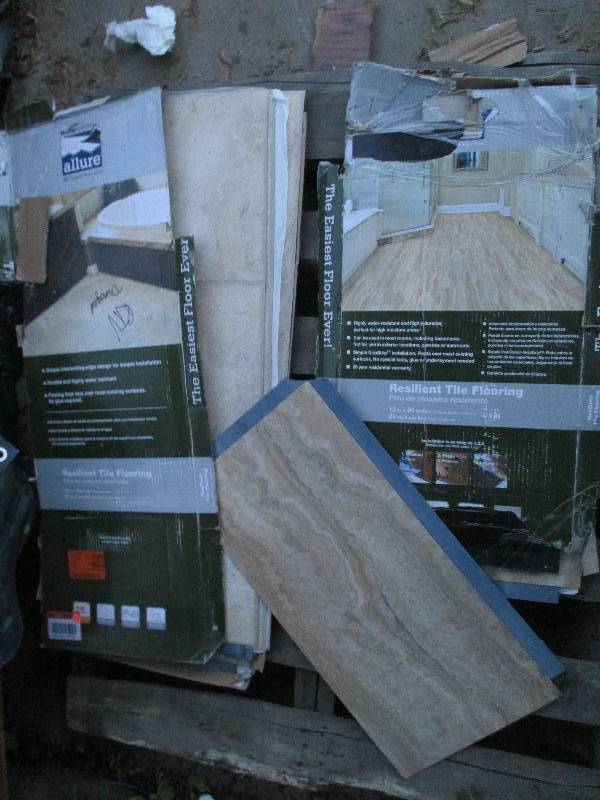 lot 61 image: 2 partial damaged case of floor cov...