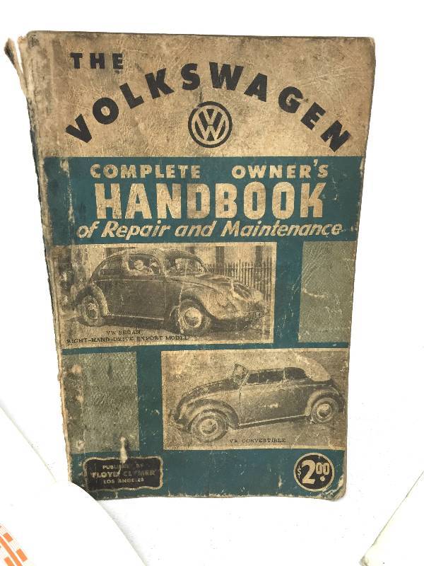 lot 11 image: Lot of 3, Volkswagen owners manuals and advertisement.