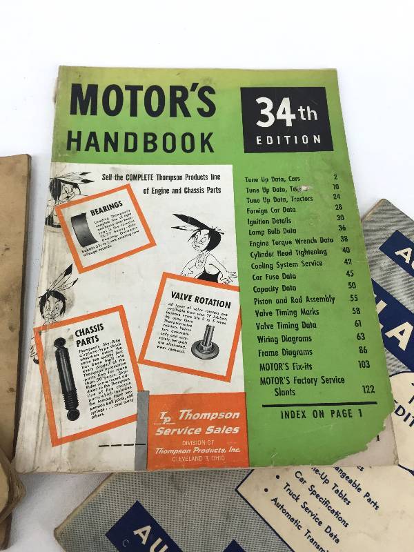lot 14 image: lot of 4 manualsownersmotor handbook.