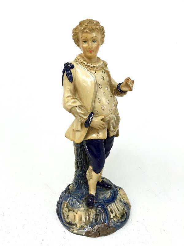 1700s German statue of a boy missing his partner