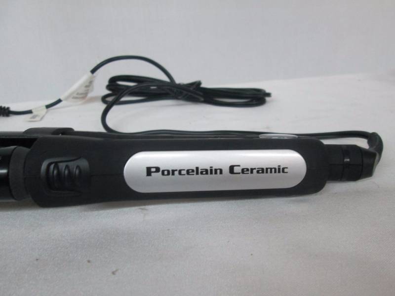 lot 79 image: BABYLISS 1 Curling Iron