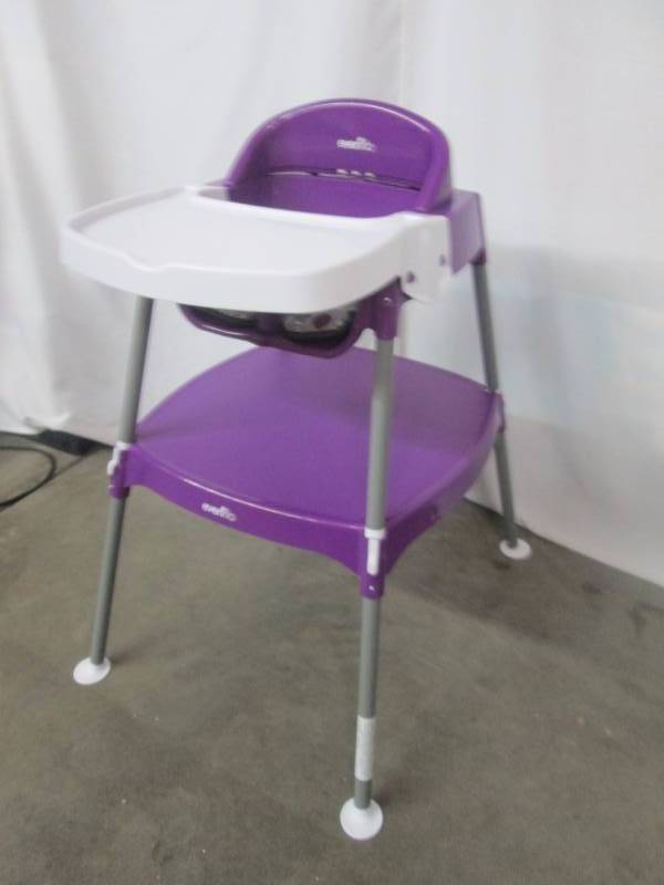 lot 24 image: Evenflo MiniMeal Convertible High Chair - Purple