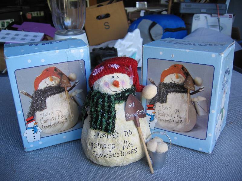 Pair of poly-resin snowmen. There...