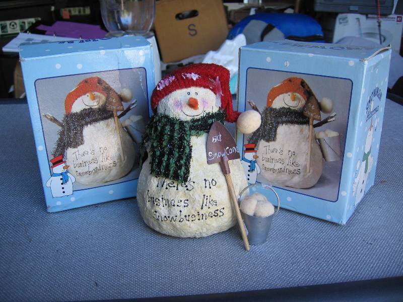 Pair of poly-resin snowmen. There...