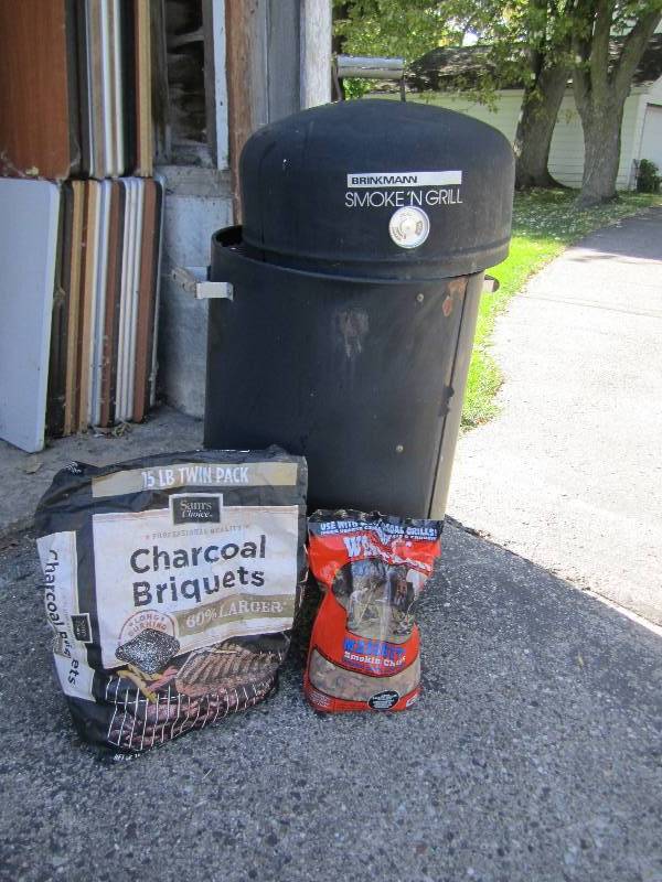Brinkman smokergrill with half bag...