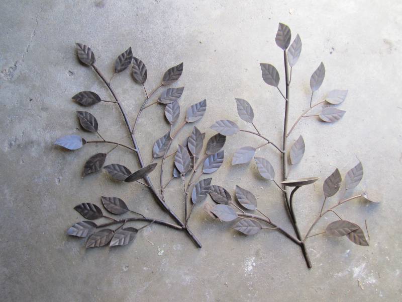 Pair of metal leaf sconces....