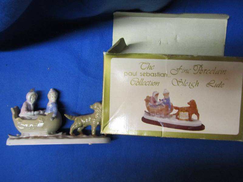 Decorative figure in original box...