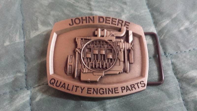 lot 74 image: John Deere Quality Engine Parts