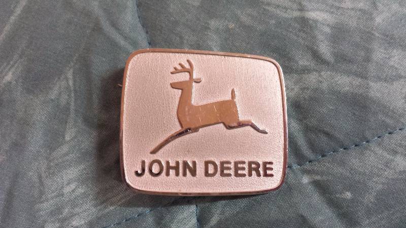 lot 129 image: John Deere Silver Buckle