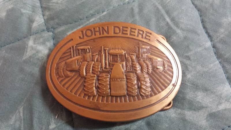 lot 132 image: John Deere (three tractors)