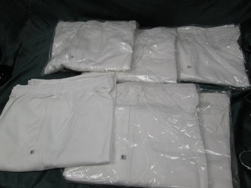 Qty 6  White pants size 42...