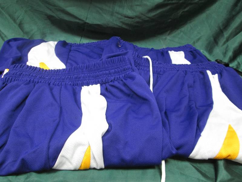 Qty 5 purple, white, and yellow sho...