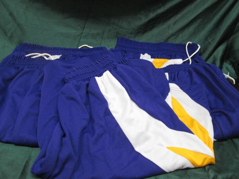 Qty 5 purple, white, and yellow sho...