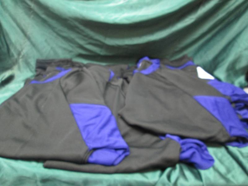 Qty 10 Black and purple jerseys siz...