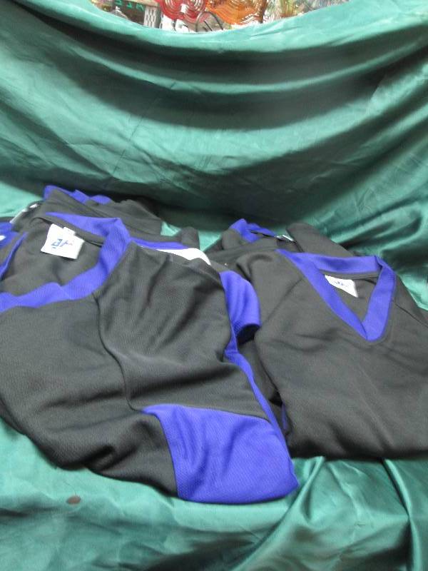 Qty 6 Black and purple jerseys size...