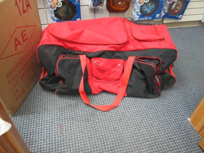 Large red tote on wheels...