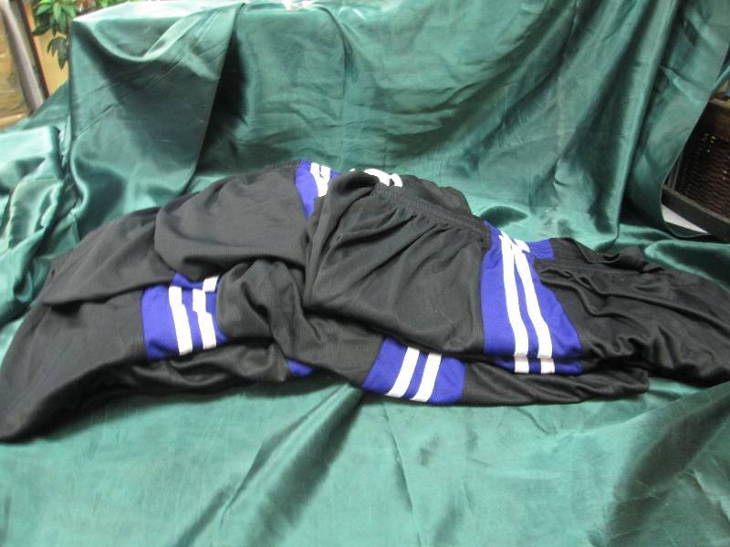 Black, purple, and white shorts siz...