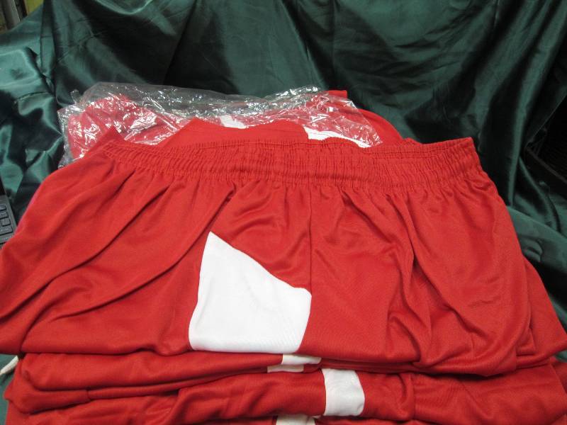 Qty 19 red arid white shorts size X...