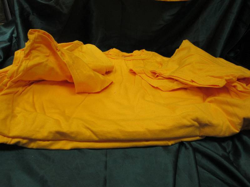 Qty 12 gold t-shirts size XL...