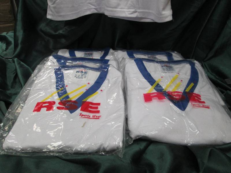 4-XL and 3-Small RSE sport wear whi...