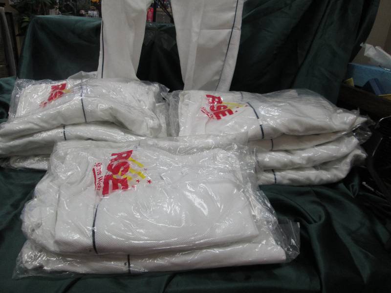 2- M, 5-L , and 4 XL white pants wi...