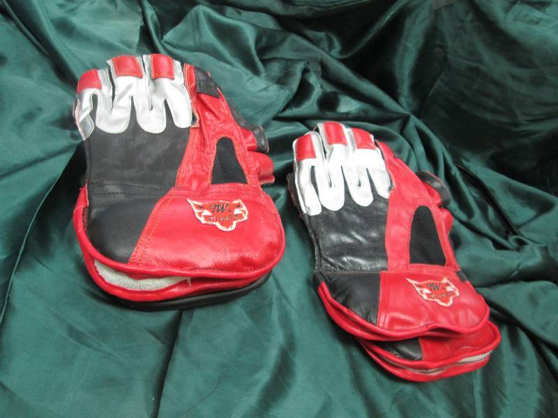 Qty 2 pairs of Winner gloves...