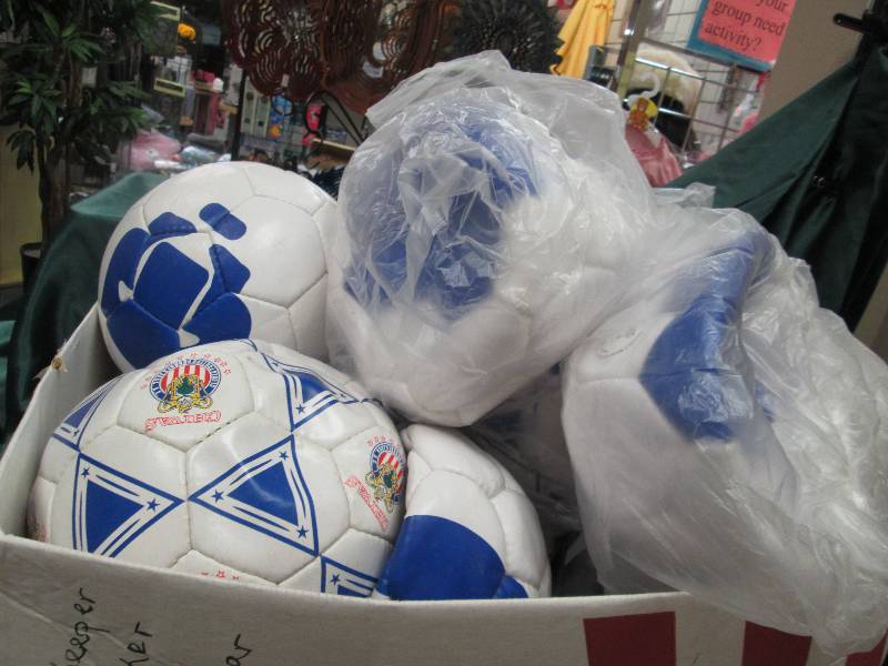 Box full of soccer balls...