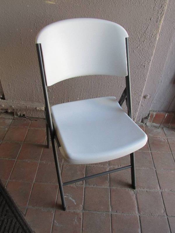 Plastic folding chair by Lifetime...