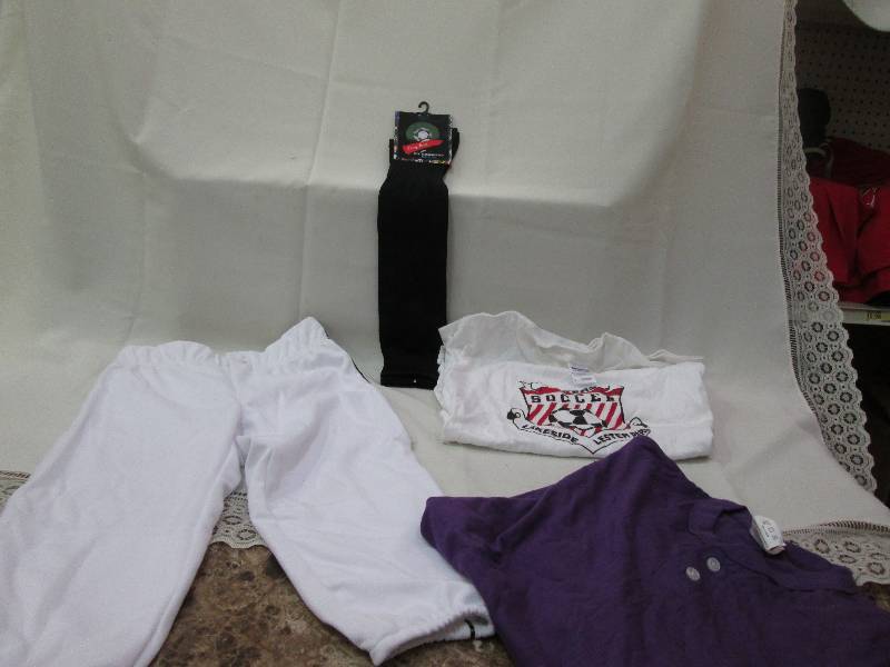 White pants with black pinstripe. P...