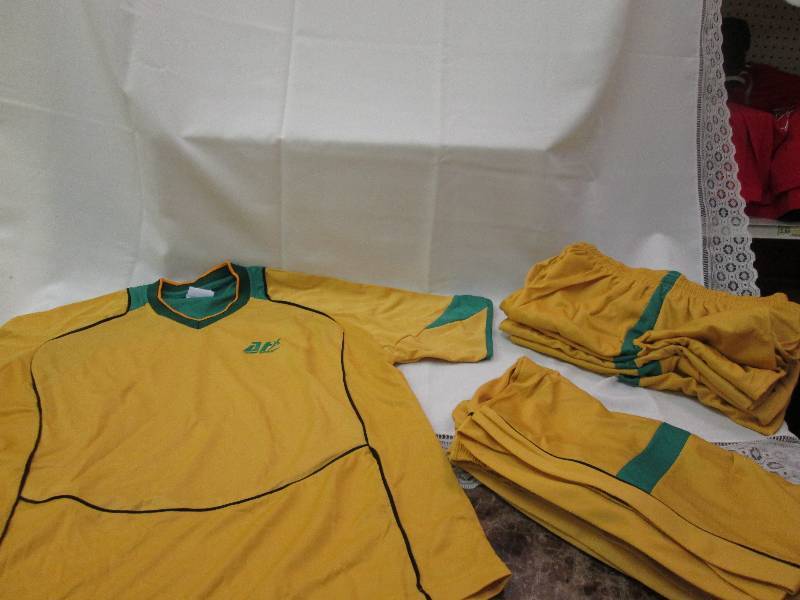 gold and green with black pinstripe...