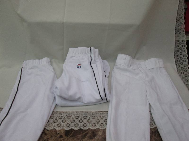 White pants with black pinstripe qt...