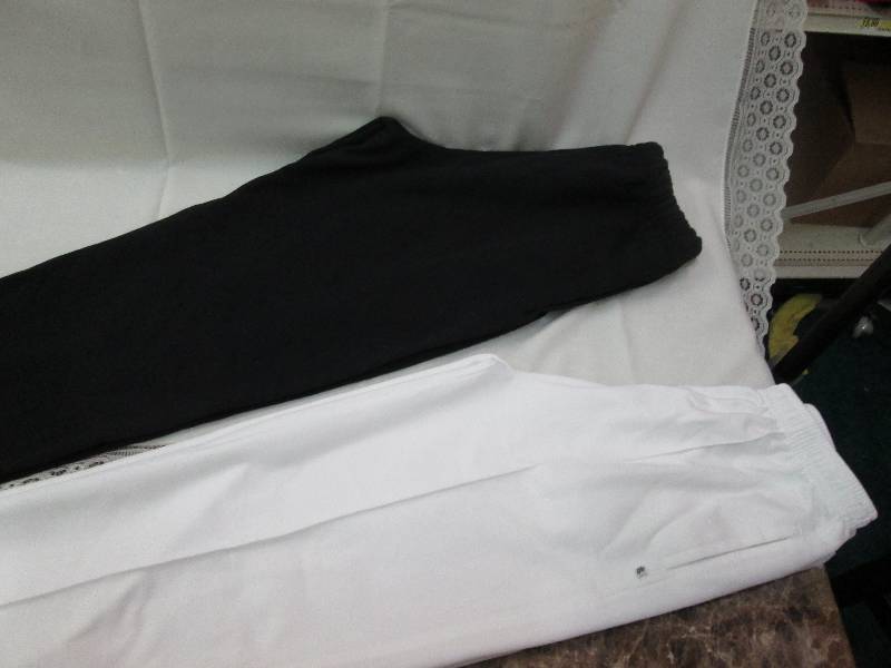 Black pair of sweatpants and white ...