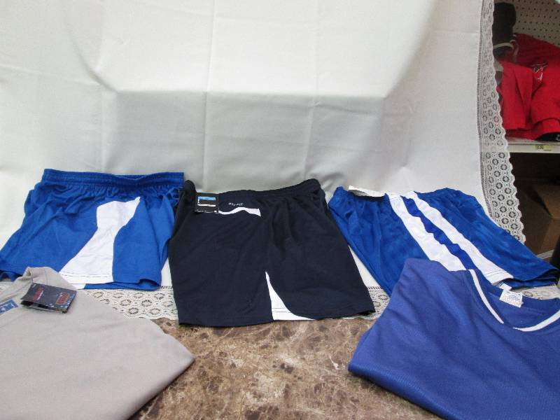 3 pairs of shorts and 2 long sleeve...