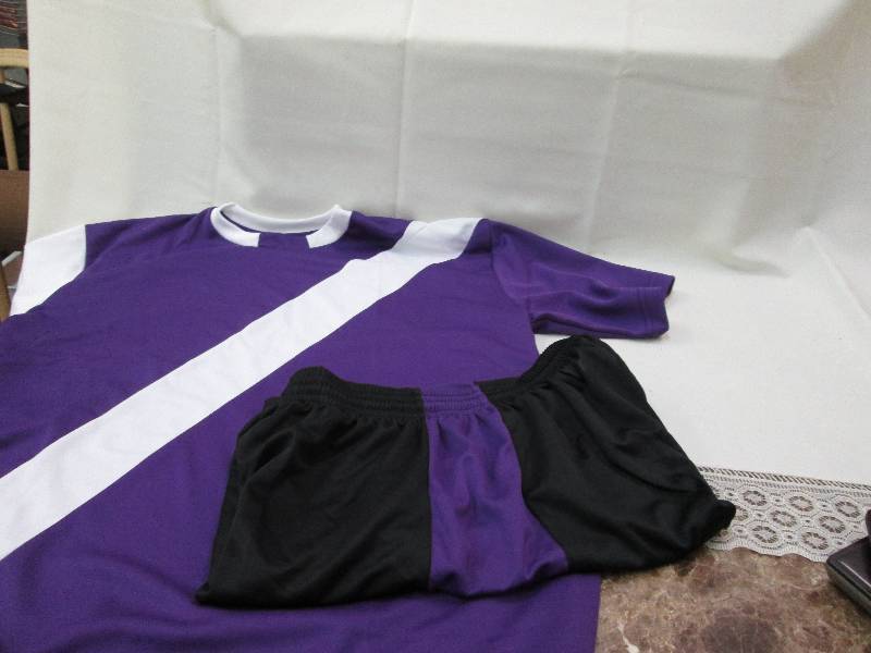 Purple & white shirt and black and ...