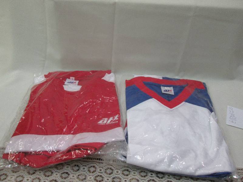 Red white and blue shirt and short ...