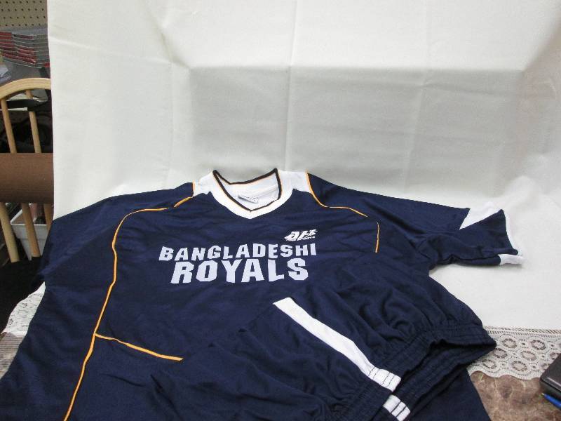 Dark blue and white with gold pinst...