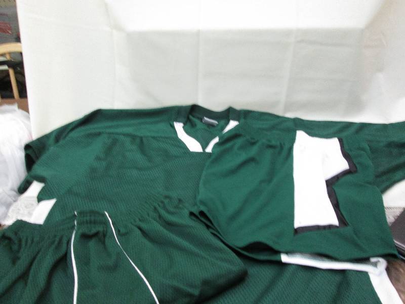 Green shirt with white accents with...