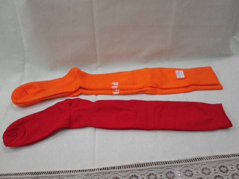 Orange (2) and Red (1) pairs of soc...