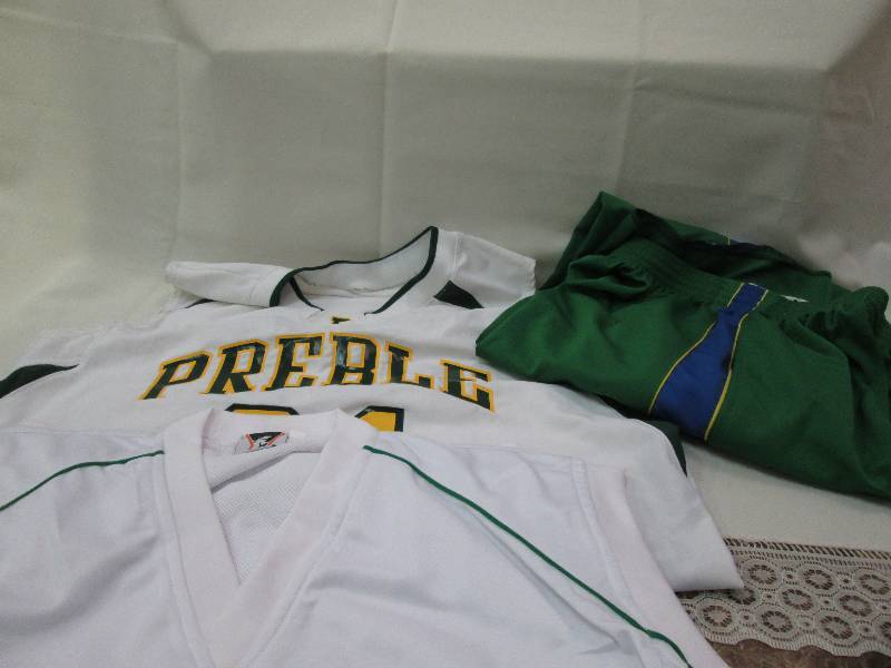 White and green shirt with number 2...