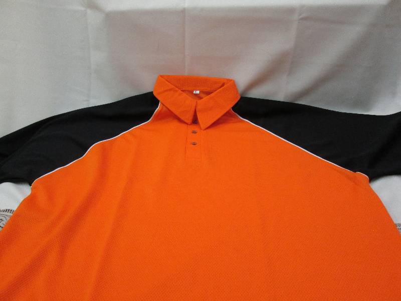Orange shirts with black and white ...