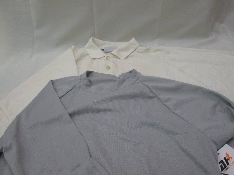 Grey long sleeved shirt and off whi...