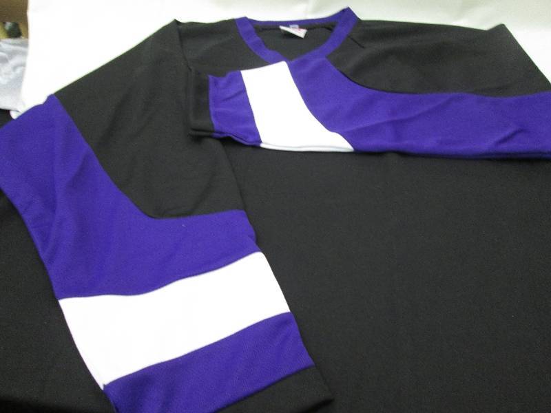 Long sleeved black jersey with purp...