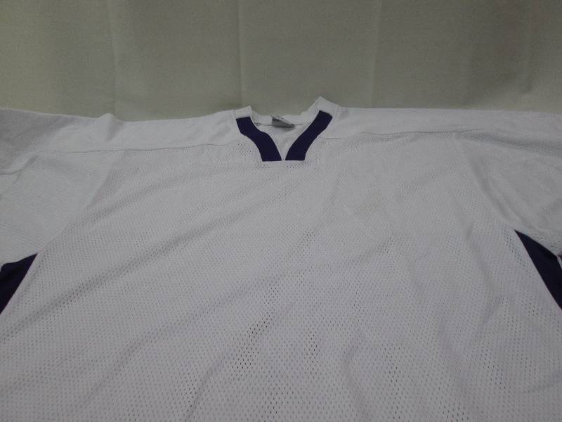 White Jersey with purple accents al...
