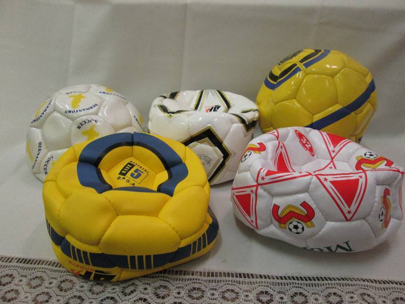 Assorted sports balls colors may va...