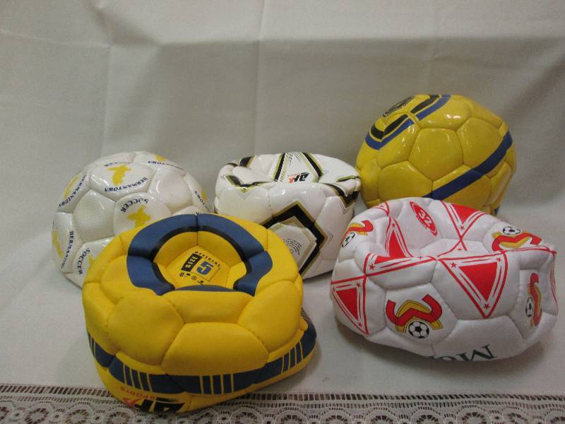Assorted sports balls colors may va...