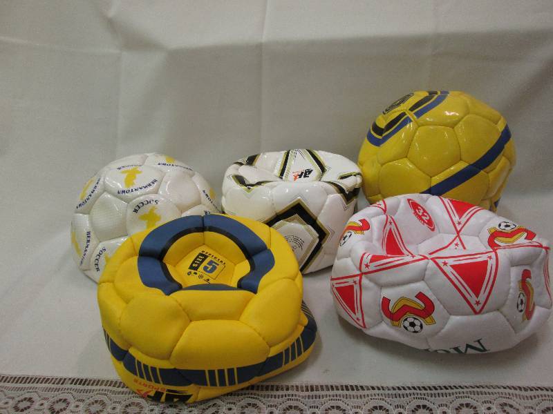 Assorted sports balls colors may va...